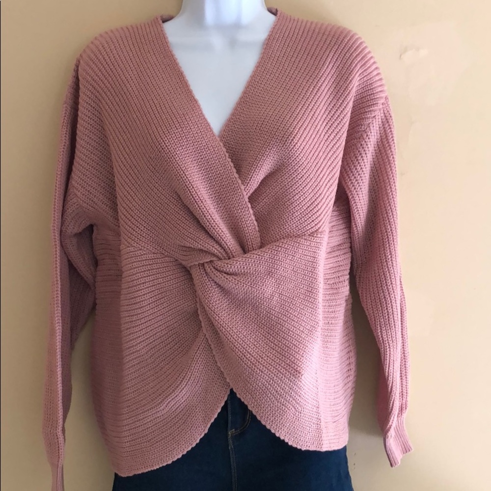 Pink sweater with knot in front